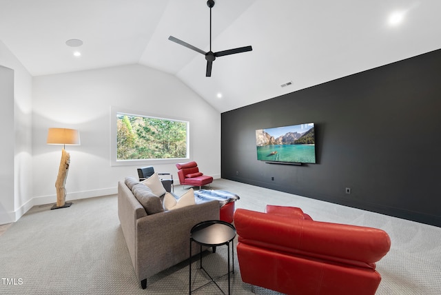 living room featuring light carpet, ceiling fan, and lofted ceiling