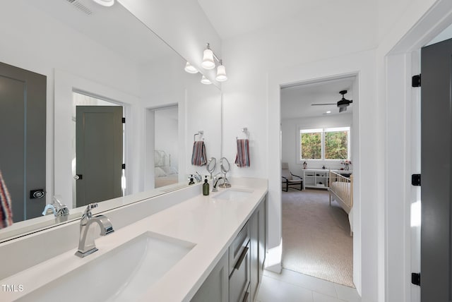 bathroom featuring ceiling fan, tile patterned flooring, and vanity