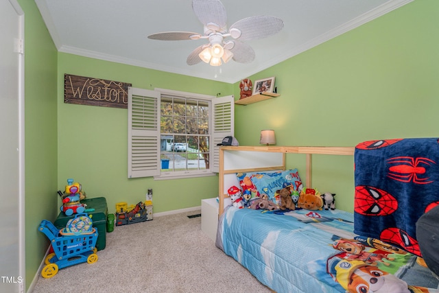 carpeted bedroom featuring ceiling fan and crown molding