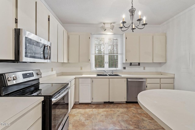 kitchen featuring appliances with stainless steel finishes, a textured ceiling, pendant lighting, and a notable chandelier