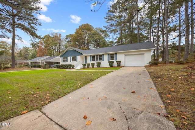 ranch-style house with a garage and a front lawn