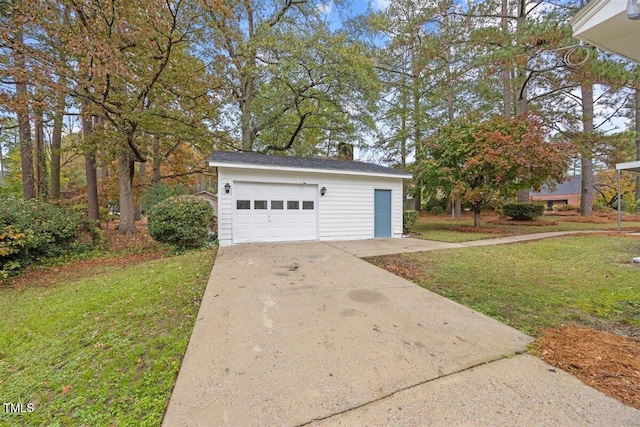 garage with a lawn