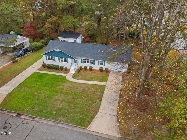 view of front of home with a front lawn