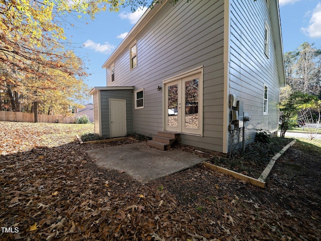 back of property featuring a patio