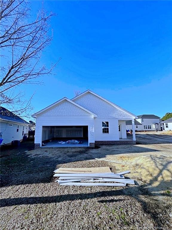 view of side of property featuring a garage