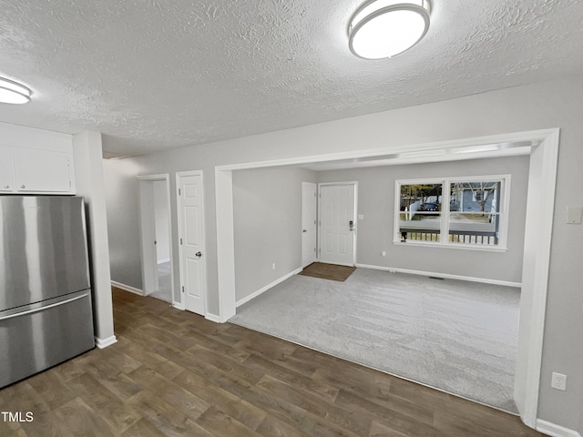 615 Wildaro Ct, Hillsborough, NC 27278 - entrance foyer featuring dark wood-style floors, a textured ceiling, and baseboards