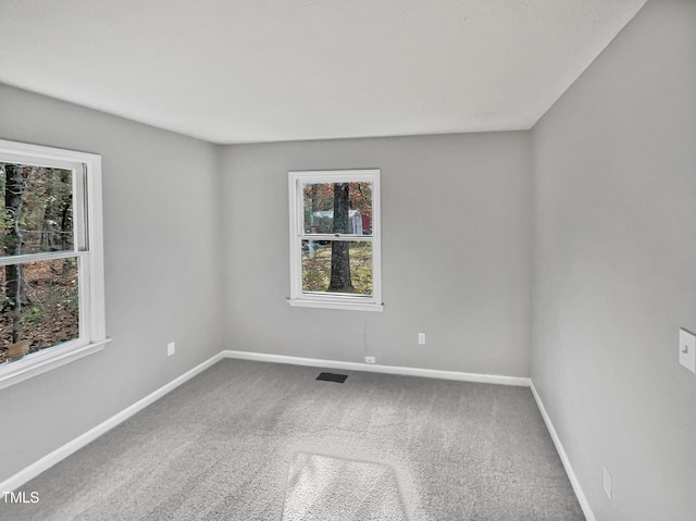 view of carpeted spare room