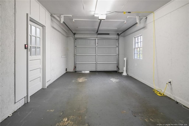 garage featuring a garage door opener