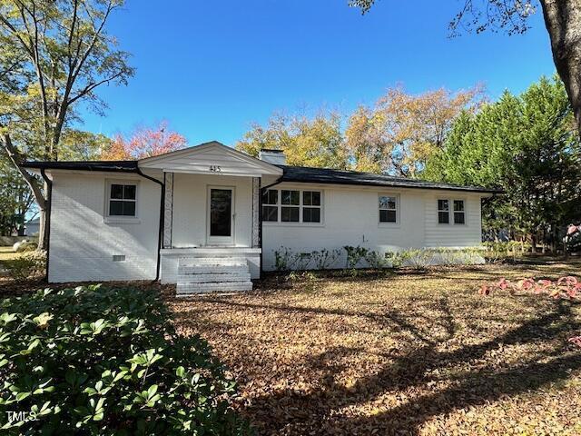 445 N Dunn St, Angier, NC 27501 - view of front of home featuring a chimney