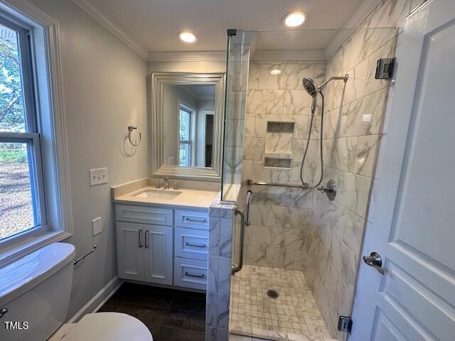 bathroom featuring walk in shower, toilet, vanity, and ornamental molding