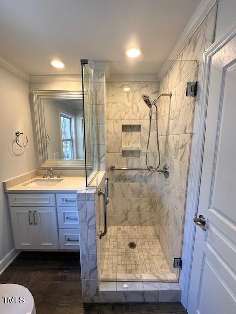 445 N Dunn St, Angier, NC 27501 - bathroom with a shower stall, ornamental molding, vanity, toilet, and recessed lighting