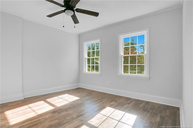 unfurnished room featuring ceiling fan, hardwood / wood-style floors, and ornamental molding