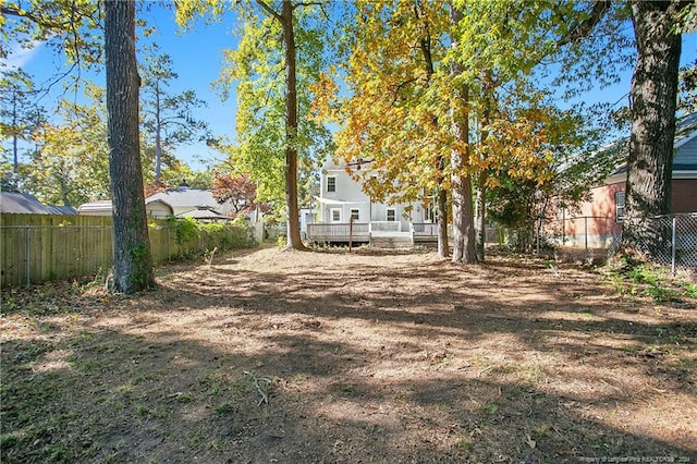 view of yard with a deck