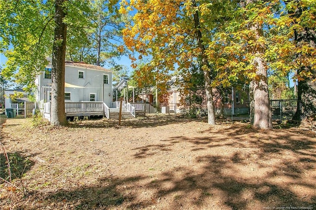 view of yard with a deck