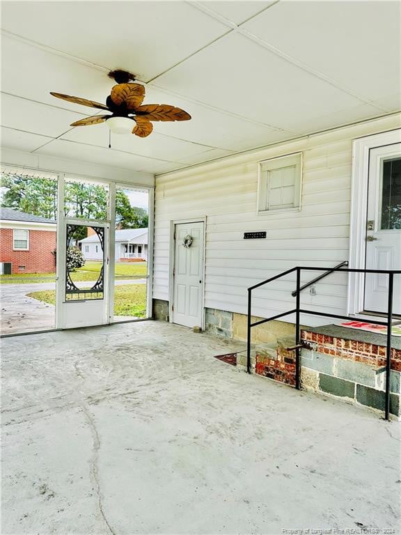 view of patio featuring ceiling fan