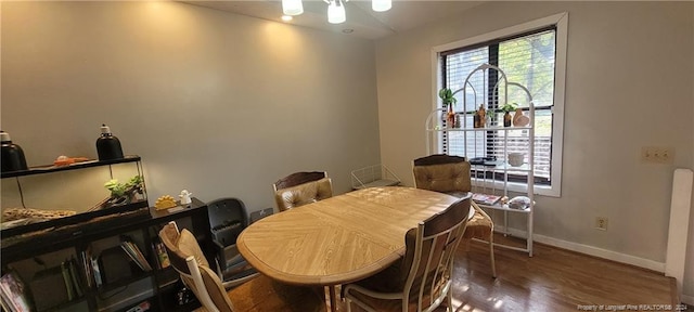 dining room featuring dark hardwood / wood-style floors