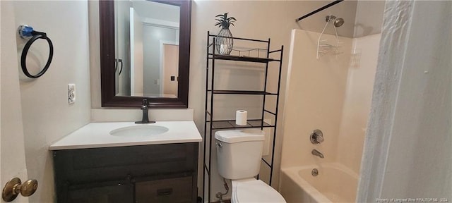 full bathroom featuring vanity,  shower combination, and toilet