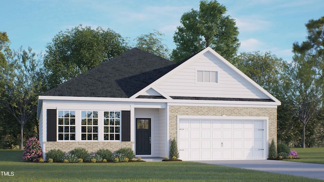 view of front of house featuring a front lawn and a garage