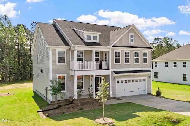 35 Accord Dr, Youngsville, NC 27596 - view of front of property with a garage, a balcony, driveway, a front lawn, and a shingled roof