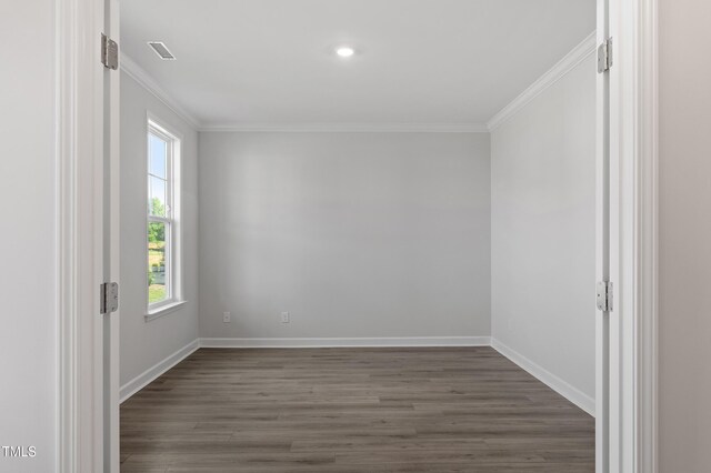 35 Accord Dr, Youngsville, NC 27596 - empty room featuring ornamental molding, dark wood-style floors, baseboards, and recessed lighting
