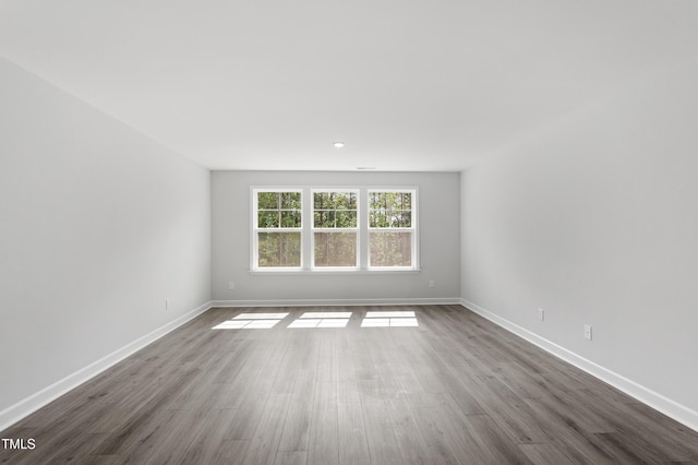 35 Accord Dr, Youngsville, NC 27596 - unfurnished room featuring dark wood-style floors and baseboards