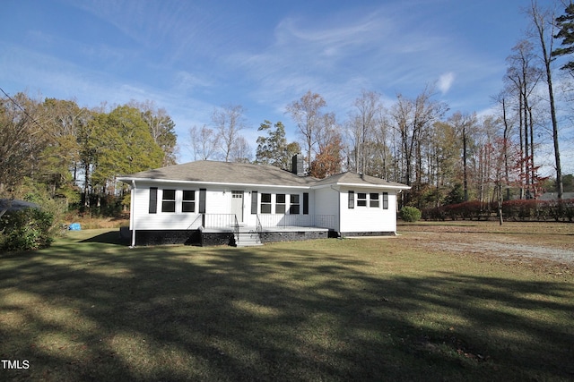 view of front of home with a front yard