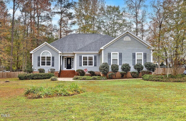 ranch-style home with a front lawn