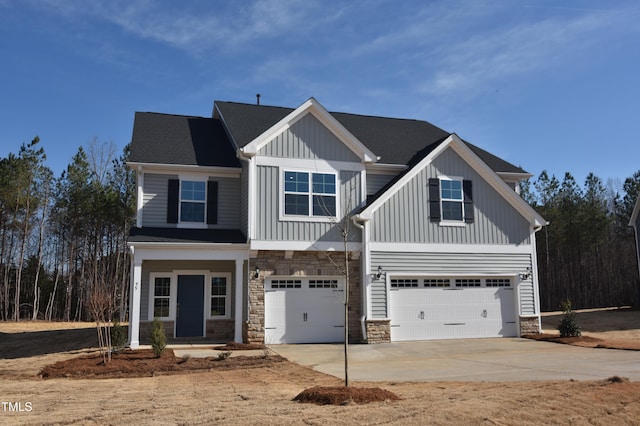 craftsman inspired home featuring a garage