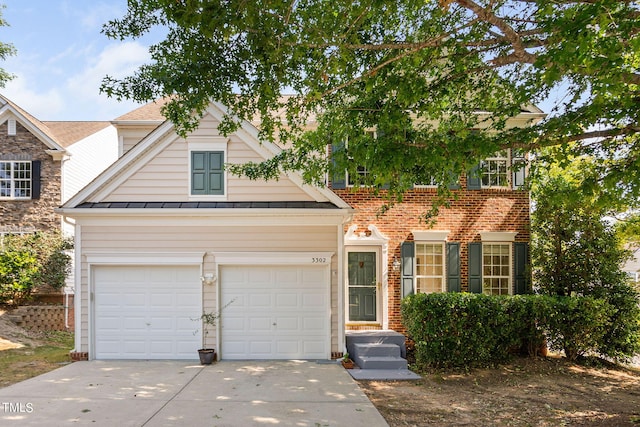 view of front of home with a garage