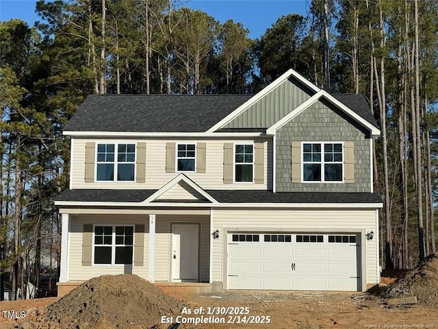 view of front of property with a garage