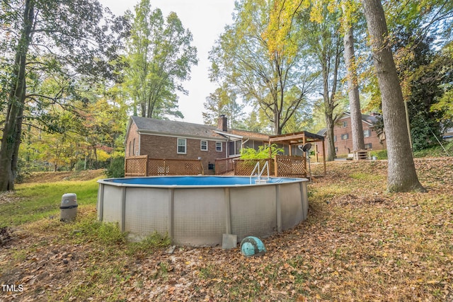 view of pool with a deck