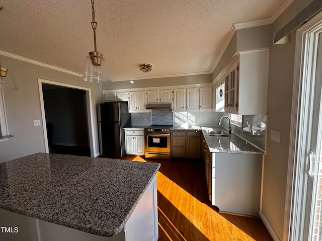 kitchen featuring stone counters, dark hardwood / wood-style floors, ornamental molding, white cabinetry, and stainless steel appliances