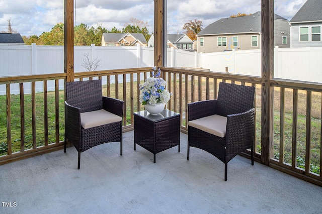 sunroom / solarium featuring plenty of natural light