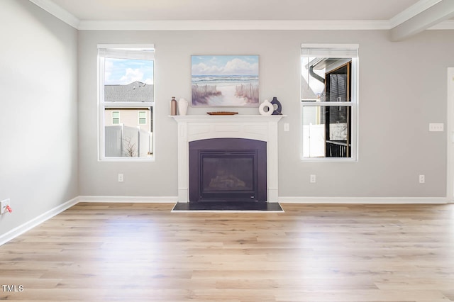 unfurnished living room featuring crown molding, light hardwood / wood-style flooring, and beamed ceiling