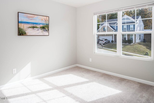 view of carpeted spare room