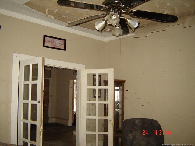 misc room with ceiling fan, french doors, and ornamental molding