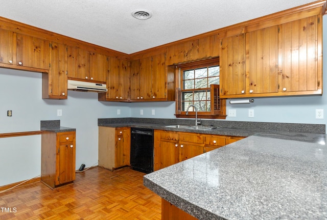 kitchen featuring sink, light parquet flooring, a textured ceiling, and black dishwasher