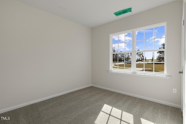 view of carpeted spare room