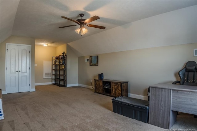 additional living space featuring light carpet, vaulted ceiling, and ceiling fan