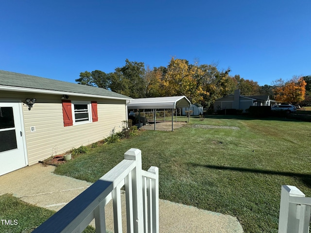 view of yard with a carport