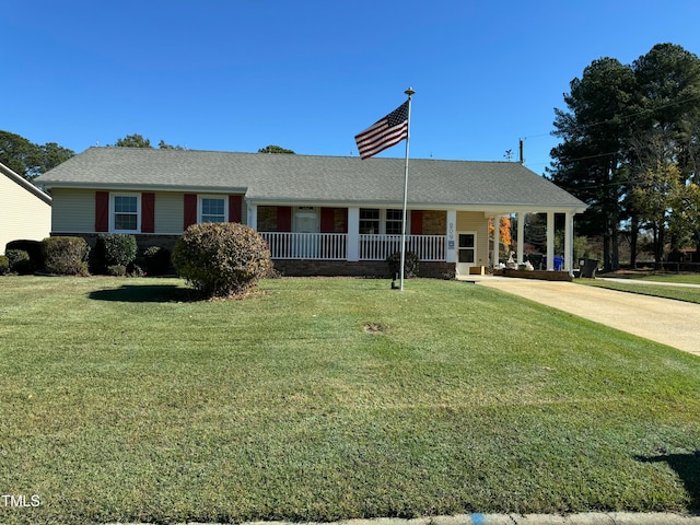 single story home featuring covered porch and a front lawn