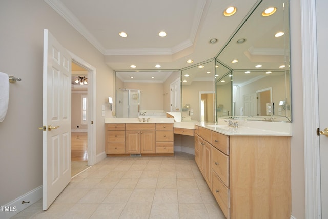 bathroom with tile patterned flooring, vanity, a shower with shower door, and crown molding