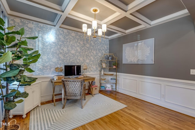 home office with coffered ceiling, light hardwood / wood-style flooring, a notable chandelier, and crown molding