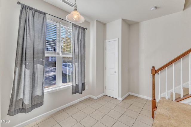 foyer with light tile patterned floors