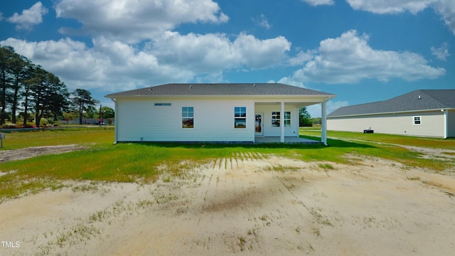 1407 Stoney Creek Church Rd, Goldsboro, NC 27534 - rear view of house with a yard