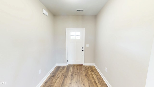 1407 Stoney Creek Church Rd, Goldsboro, NC 27534 - doorway with wood finished floors and baseboards