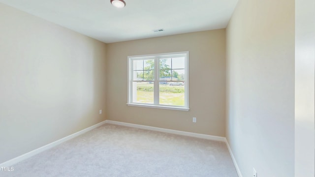 1407 Stoney Creek Church Rd, Goldsboro, NC 27534 - unfurnished room with light carpet and baseboards