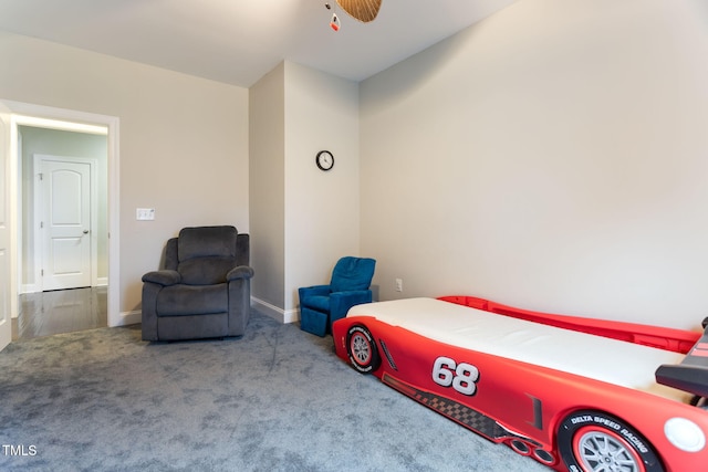 bedroom with ceiling fan and carpet flooring