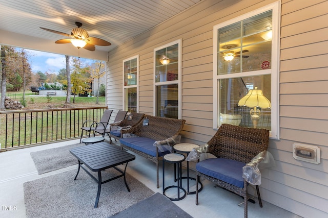 view of patio / terrace featuring ceiling fan