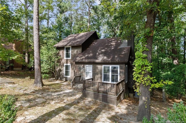 exterior space featuring a wooden deck